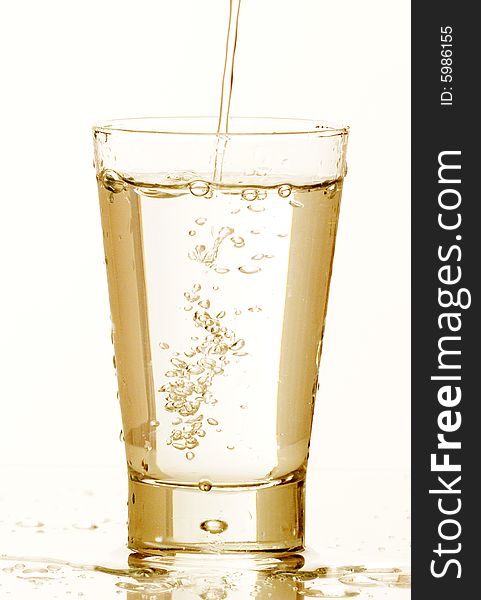 Glass of clear water against white background. Glass of clear water against white background