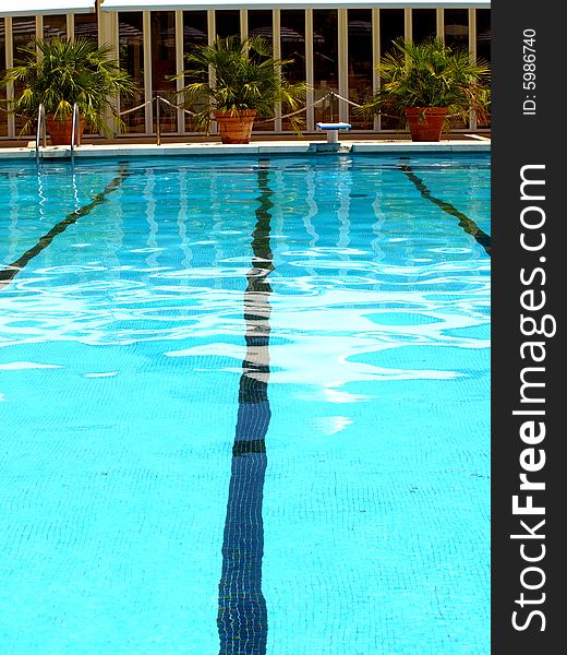 A good shot of a swimming pool in a hotel