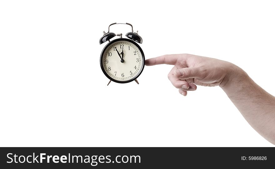 Working till late hours old fashioned clock with hand. Working till late hours old fashioned clock with hand