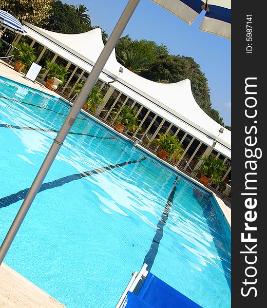 An original shot of a pool in a hotel