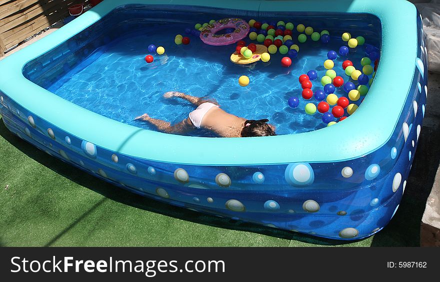 A big blue swimming pool