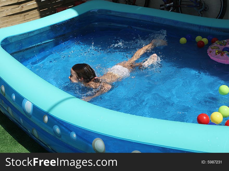 A big blue swimming pool