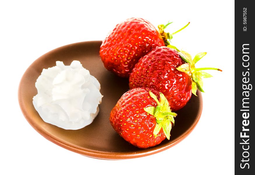 Strawberry on plate over white background