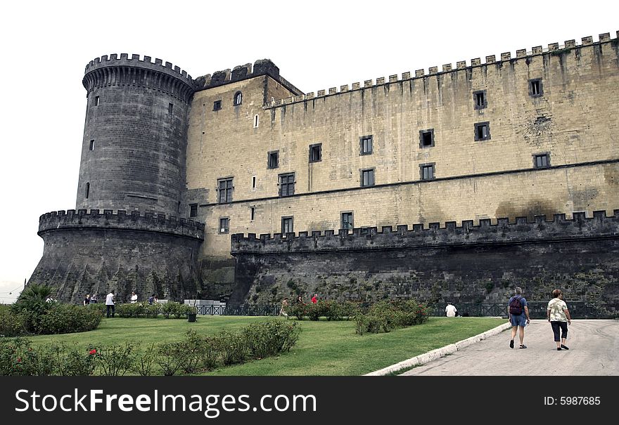 Castel Nuovo (New Castle), also called Maschio Angioino, medieval castle in Naples, Italy. Towers and renaissance portal. Low angle view