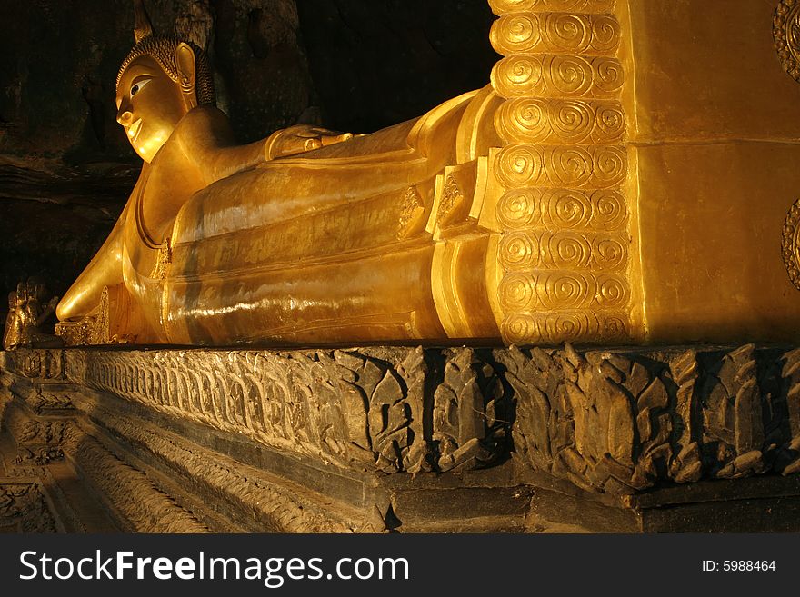 A Buddha face in a cave at thailand. A Buddha face in a cave at thailand