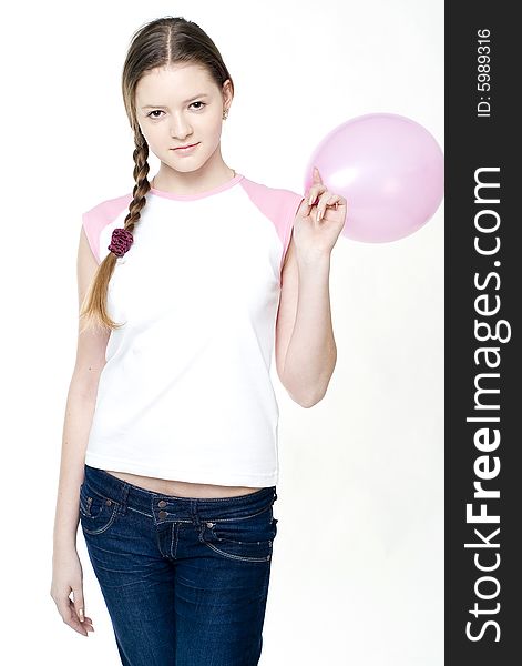 Young pretty girl with pink air ball. Young pretty girl with pink air ball