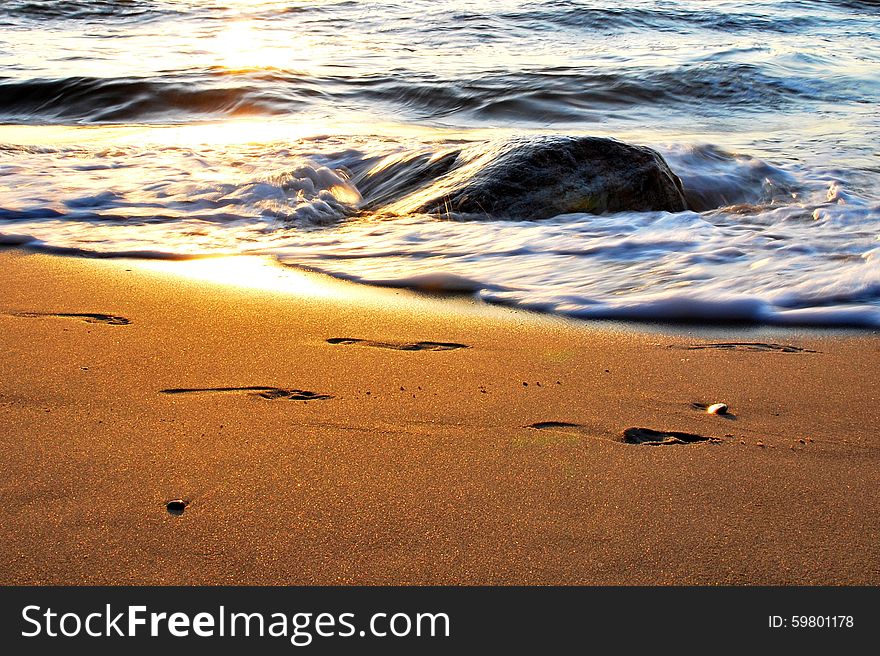 The sunset on the beach - romantic place