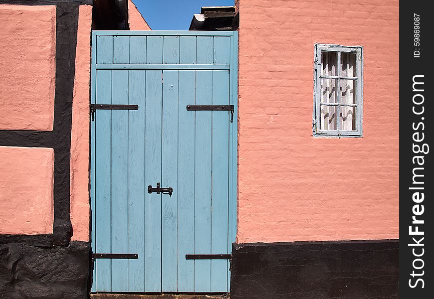 Bright vivid beautiful colors traditional classical painted front wooden door. Bright vivid beautiful colors traditional classical painted front wooden door