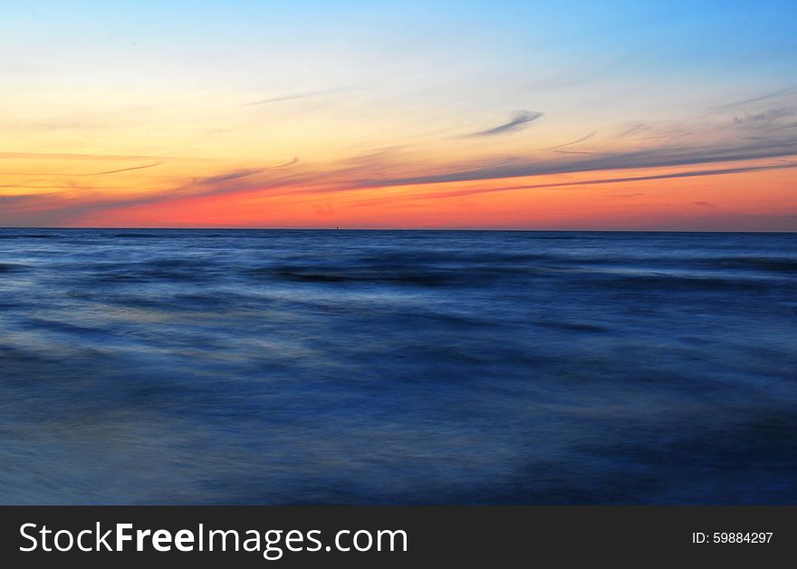 The sunset on the beach - romantic place