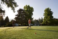 Couple Playing Golf On Course - Horizontal Stock Images