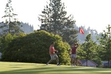 Man And Woman On Golf Course - Horizontal Stock Photography