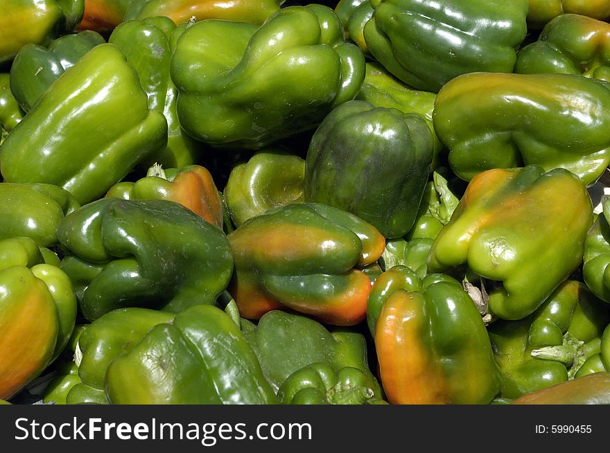 It is a picture of a stall of green peppers