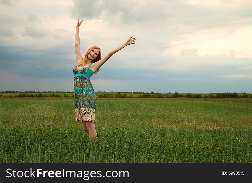 Happy girl in a field. Happy girl in a field