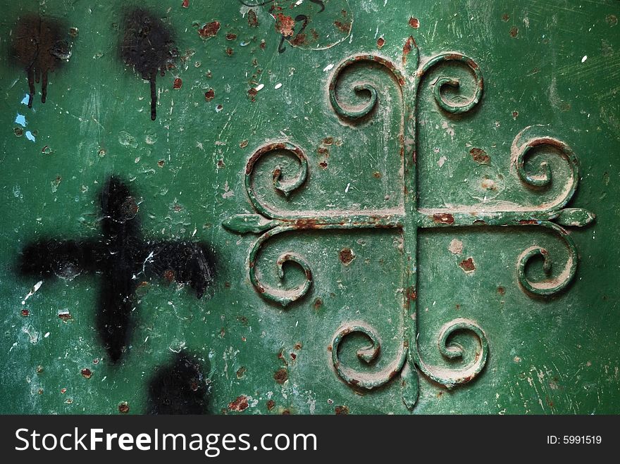 Old metal green door with cross. Old metal green door with cross