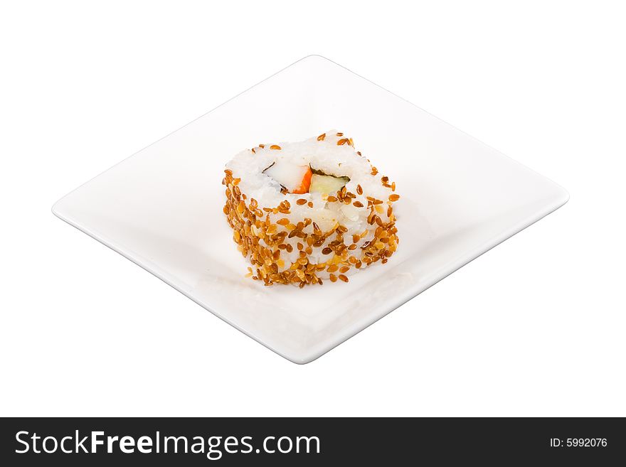 A square white plate with a piece of sushi