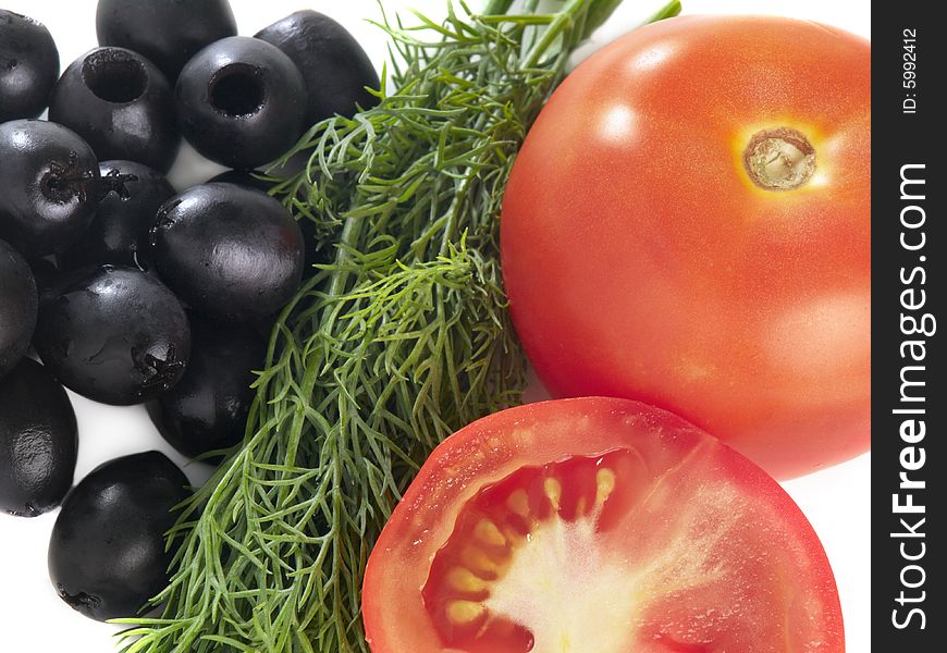 Ingredients for vegetarian salad - tomatos, dill and olives. Ingredients for vegetarian salad - tomatos, dill and olives