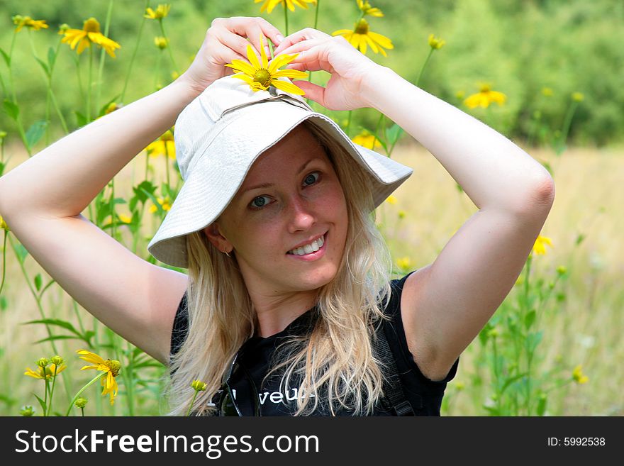 The photograph of the girl abloom of field. The photograph of the girl abloom of field