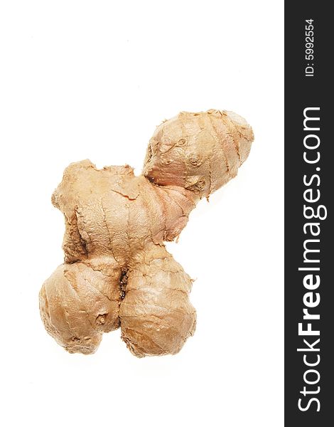 A piece of root ginger isolated on white