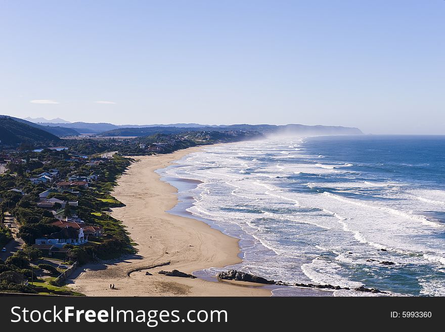 The beautiful long sandy beach of the South African town called Wilderness. The beautiful long sandy beach of the South African town called Wilderness.