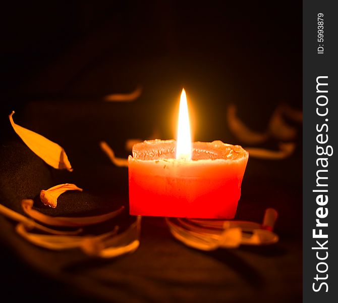 Fire candle on black background for your design