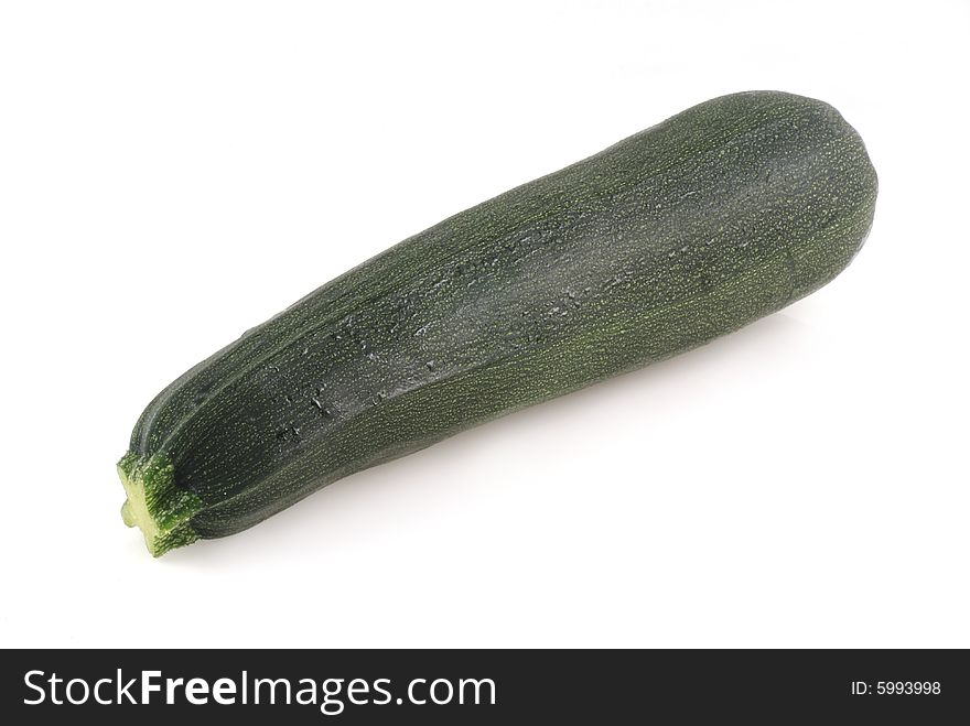 One zucchini isolated on a white background. One zucchini isolated on a white background.