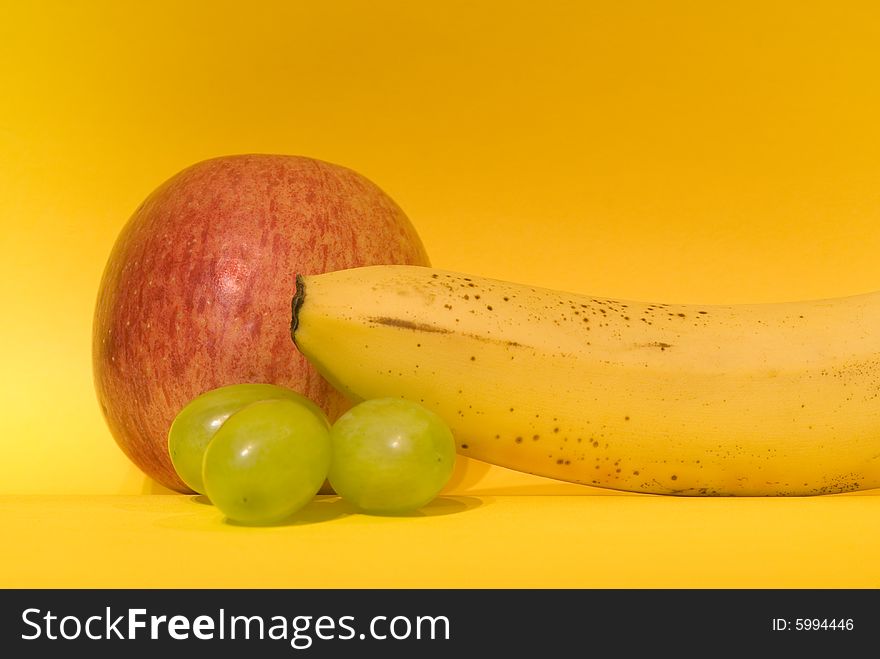 An arrangement of several fruits in the yellow theme. An arrangement of several fruits in the yellow theme