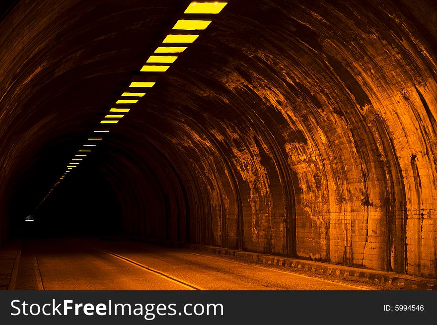 Tunnel capture with light at the end. Camera used was a Nikon D70S with a 18-70mm lens set to 1/125 sec at f/4.5 without flash and ISO 1600. Tunnel capture with light at the end. Camera used was a Nikon D70S with a 18-70mm lens set to 1/125 sec at f/4.5 without flash and ISO 1600