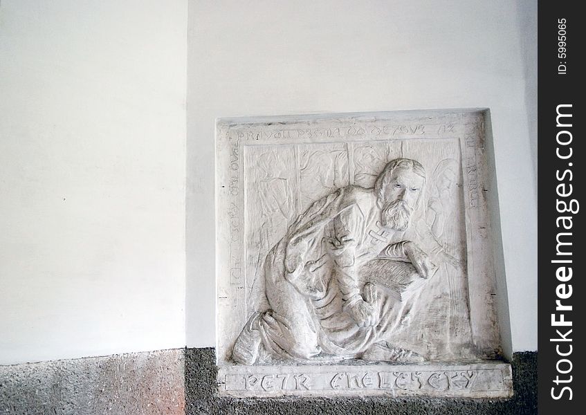 Relief image of man on a white wall. Relief image of man on a white wall