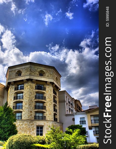 Contemporary hotel on a bright and windy day.