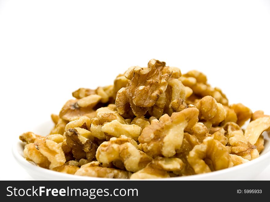 Raw walnuts - isolated on white.