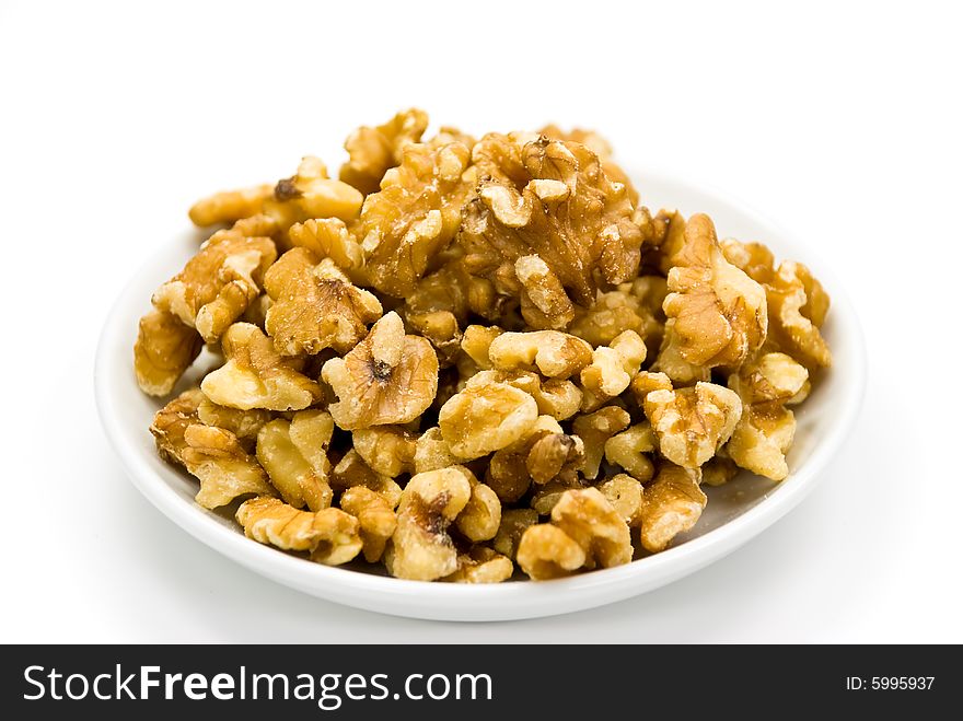 Raw walnuts - isolated on white.