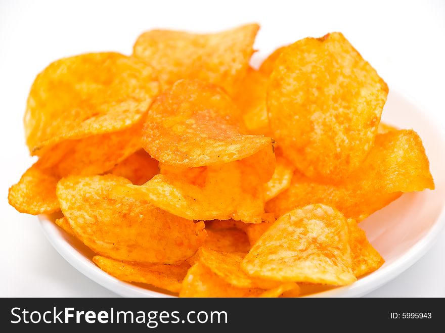 Fresh potato chips with red pepper