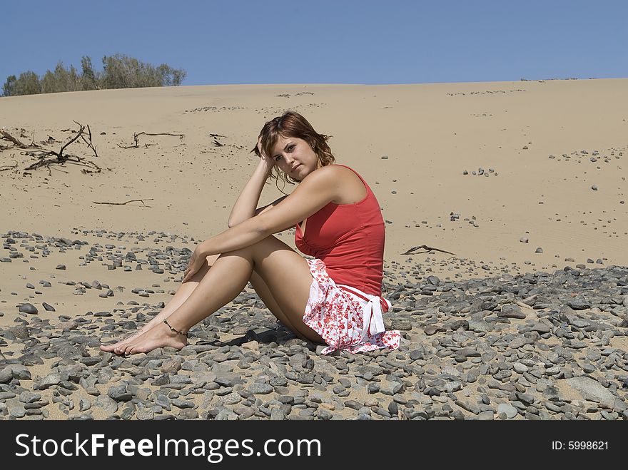 Woman In A Desert Dune