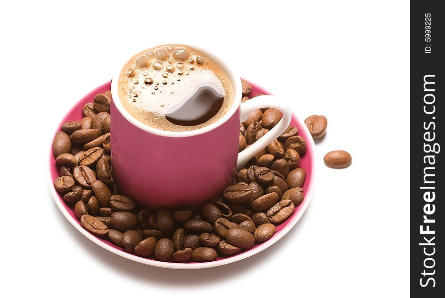Isolated cup of coffee and coffee-beans on white background. Isolated cup of coffee and coffee-beans on white background
