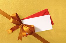 Christmas Or Birthday Card, Gold Gift Ribbon Bow Corner Diagonal, Shiny Gold Background, Copy Space Royalty Free Stock Photo Christmas Or Birthday Card, Gold Gift Ribbon Bow Corner Diagonal, Shiny Gold Background, Copy Space Royalty Free Stock Photo