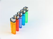 Five Lighters In A Row Royalty Free Stock Photography