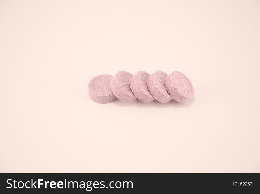 Five pink candies