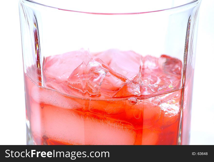 Glass With Ice and Red Liquid. Glass With Ice and Red Liquid