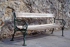 Old Bench Against Rock Royalty Free Stock Image Old Bench Against Rock Royalty Free Stock Image