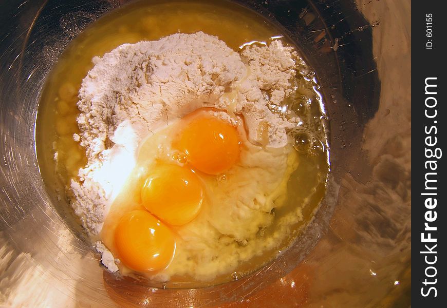 Cooking a cake, three eggs, oil and flour. Cooking a cake, three eggs, oil and flour