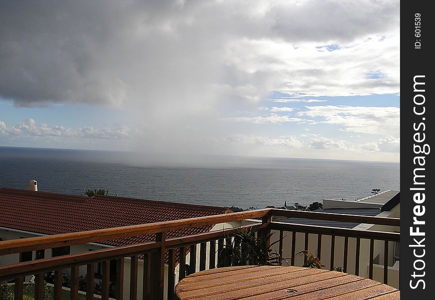 Rain storm over the ocean in Heroldsbay, South Africa