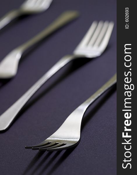 Forks isolated on blue. Forks isolated on blue