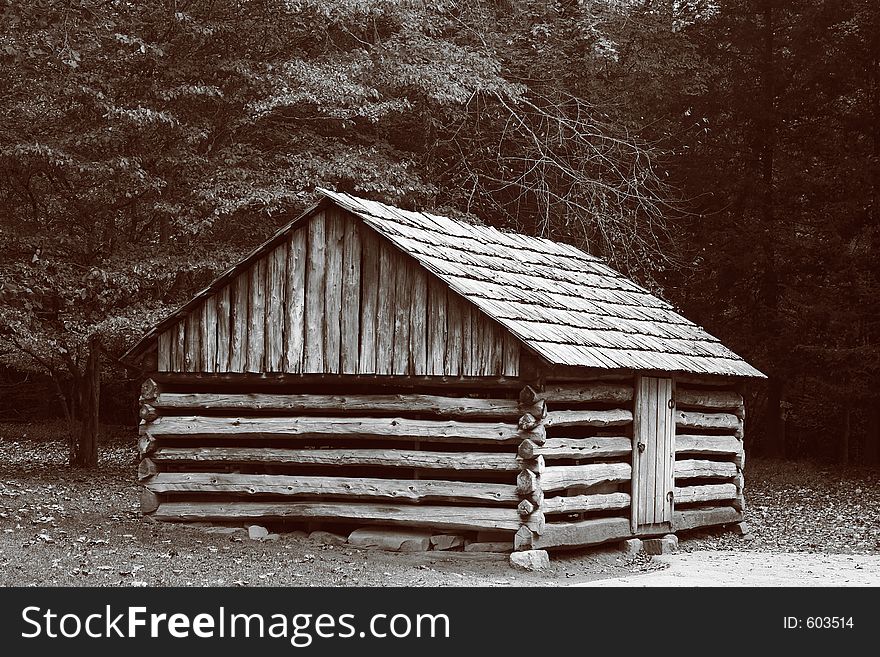 A log cabin at Cades Cove in the Smoky Mountains. A log cabin at Cades Cove in the Smoky Mountains