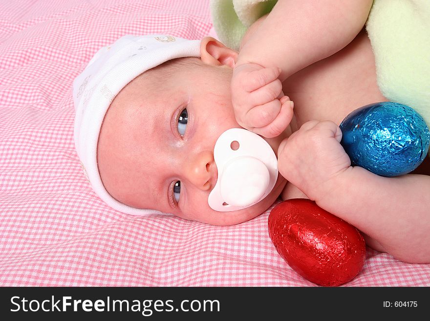 Young baby on first easter hunt. Young baby on first easter hunt