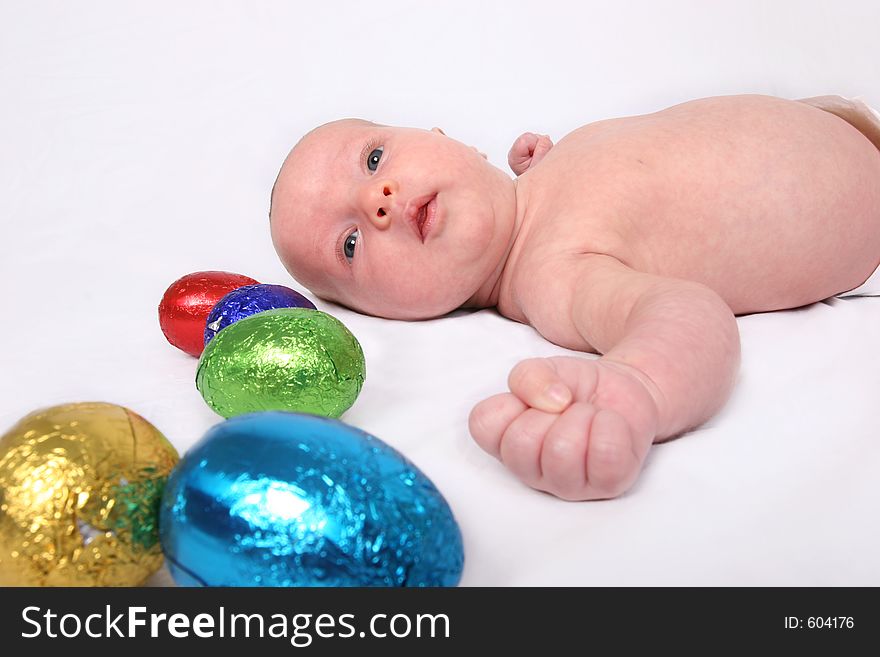 Young baby on first easter hunt. Young baby on first easter hunt