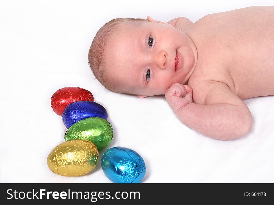 Young baby on first easter hunt. Young baby on first easter hunt