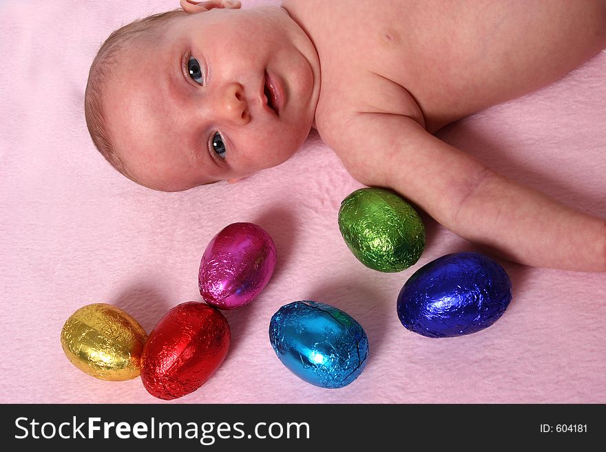 Young baby on first easter hunt. Young baby on first easter hunt