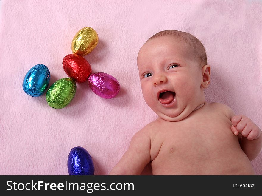 Young baby on first easter hunt. Young baby on first easter hunt