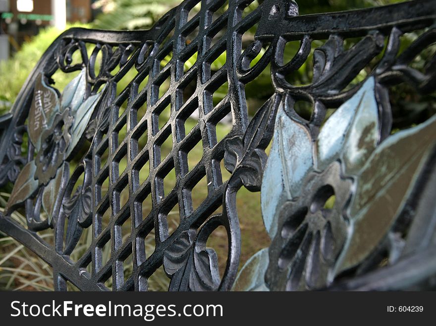 Wrought iron urban park bench