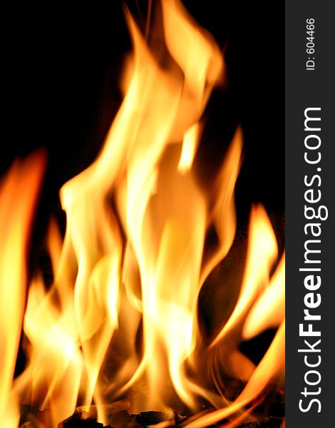 Detail of fire against black background